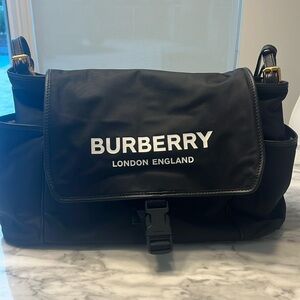 Burberry black flap diaper bag 10 in by 17 in about 6 inches wide